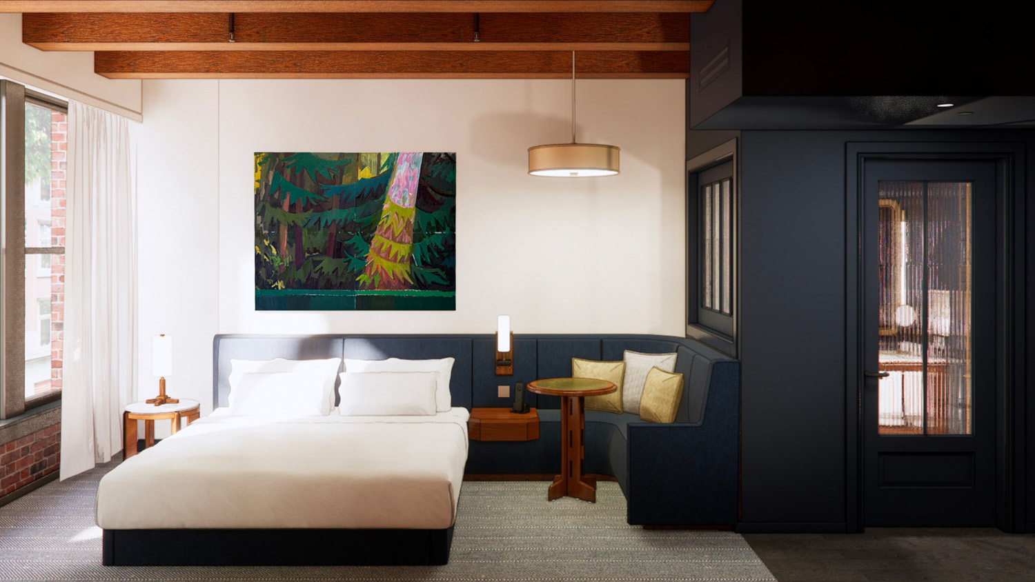 Interior of a King Room at Populus Seattle featuring a plush king-size bed with white linens, a cozy built-in navy banquette with a round wood table, large abstract woodland artwork above the headboard, exposed ceiling beams, and a mix of modern and natural textures throughout the space.