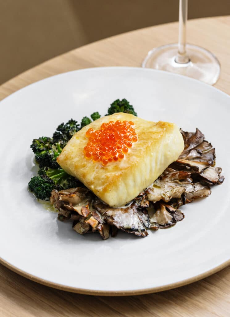 Alaskan Halibut with Maitake Mushroom, Smoked Sabayon, Trout Roe, and Rosemary Oil