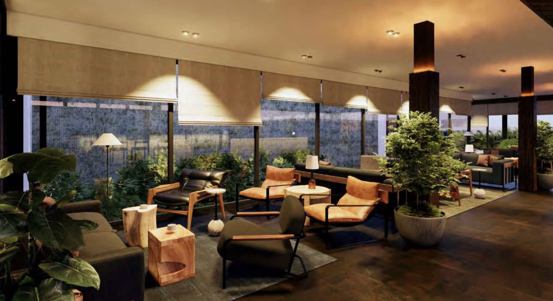 Evening view of the rooftop lounge at Populus Seattle, featuring modern seating, warm lighting, floor-to-ceiling windows, and lush potted greenery